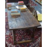 An early part 18th century waxed pine refectory table,