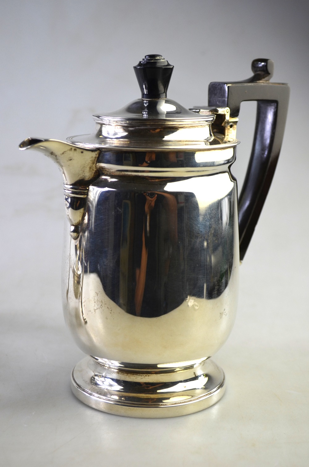An Edwardian heavy quality silver hot water jug on stemmed foot with ebonised handle, - Image 6 of 6