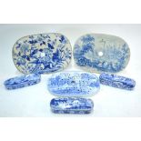 Three Staffordshire blue and white oval meat drainers, and three rounded rectangular boxes, similar.