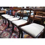 A set of six 19th century mahogany rope back side chairs with bar backs over fabric seats raised on