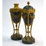 A fine pair of 19th century French ormolu mounted variegated green marble urns,