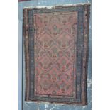 A Persian Malayer rug, the repeating design on brick ground with blue rosette border,