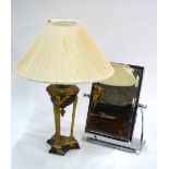An Egyptian Revival style gilt metal table lamp to/w a chrome plated table top mirror (2)