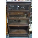 A Globe Wernicke four section dark oak library bookcase,