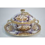 A Dresden two handled cup and saucer with domed cover and bud finial;