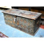 An antiques brass studded Zanzibar chest with decorative lock clasp,