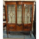 An Edwardian Sheraton revival astragal glazed satinwood display cabinet,