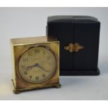 A Zenith Watch Co Swiss gilt metal travel alarm clock with gilt dial, 5.