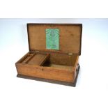 A 19th century oak box with lift-out fitted tray and brass side-handles,
