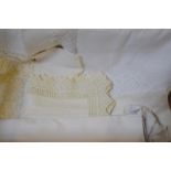 A small collection of table linen to include embroidered tablecloths with crocheted edging,
