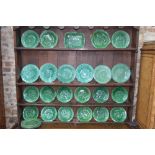 A collection of 19th century green majolica leaf plates including one dozen 19.