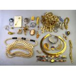 Lot containing gilt metal fringe necklace, four imitation pearl necklaces, gilt metal chains,