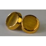 A pair of circular hollow yellow metal cufflinks with brushed decoration to front, approx 6.