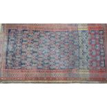 An old Persian Malayer rug, the repeating design on navy blue ground within repeating borders,