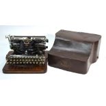 A Hammond Multiplex portable typewriter with plywood case,