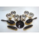 A silver, tortoiseshell and pique-work five-piece brush set,