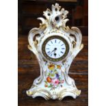 Leroy A Paris - a French rococo style porcelain clock painted with sprays of flowers and gilt
