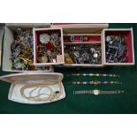 Two boxes containing mostly vintage brooches, watches, rings,