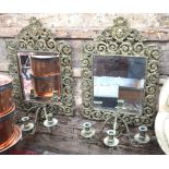 A pair of cast brass Florentine girandole mirrors, the scrolling frames surmounted by masks,