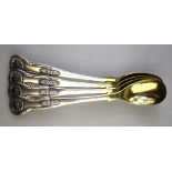 A set of four Victorian Scottish silver Queens pattern mustard spoons with gilt bowls,