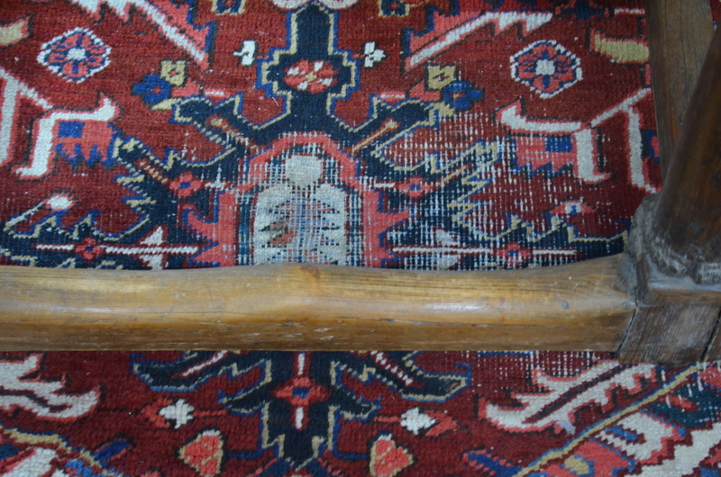 A Persian Heriz carpet, the large central blue medallion on red ground with stylised floral design, - Image 6 of 7