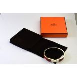 Hermes clic-clac, bangle in red enamel, with pouch and box, 6.