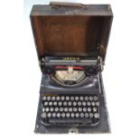 A German cased Urania portable typewriter,