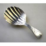 A George III silver caddy spoon with bright-cut stem and shell bowl, IB,