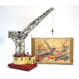 A post-war German tinplate dockside crane with clockwork movement to/w original box - made in