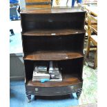 A Victorian style mahogany bowfront waterfall open bookcase with drawer to base,