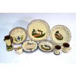 A small collection of Torquay motto ware, including Watcombe and Longpark,