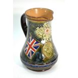 A Doulton Lambeth jug commemorating 'The Hoisting of the Flag at Pretoria, June 5th 1900',