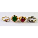 Four rings including green jade cabochon, yellow metal setting stamped 14k; ruby single stone,