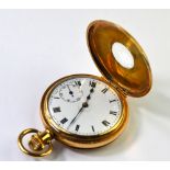 A gilt metal half hunter pocket watch with 7-jewel Swiss top-wind movement and Dennison case