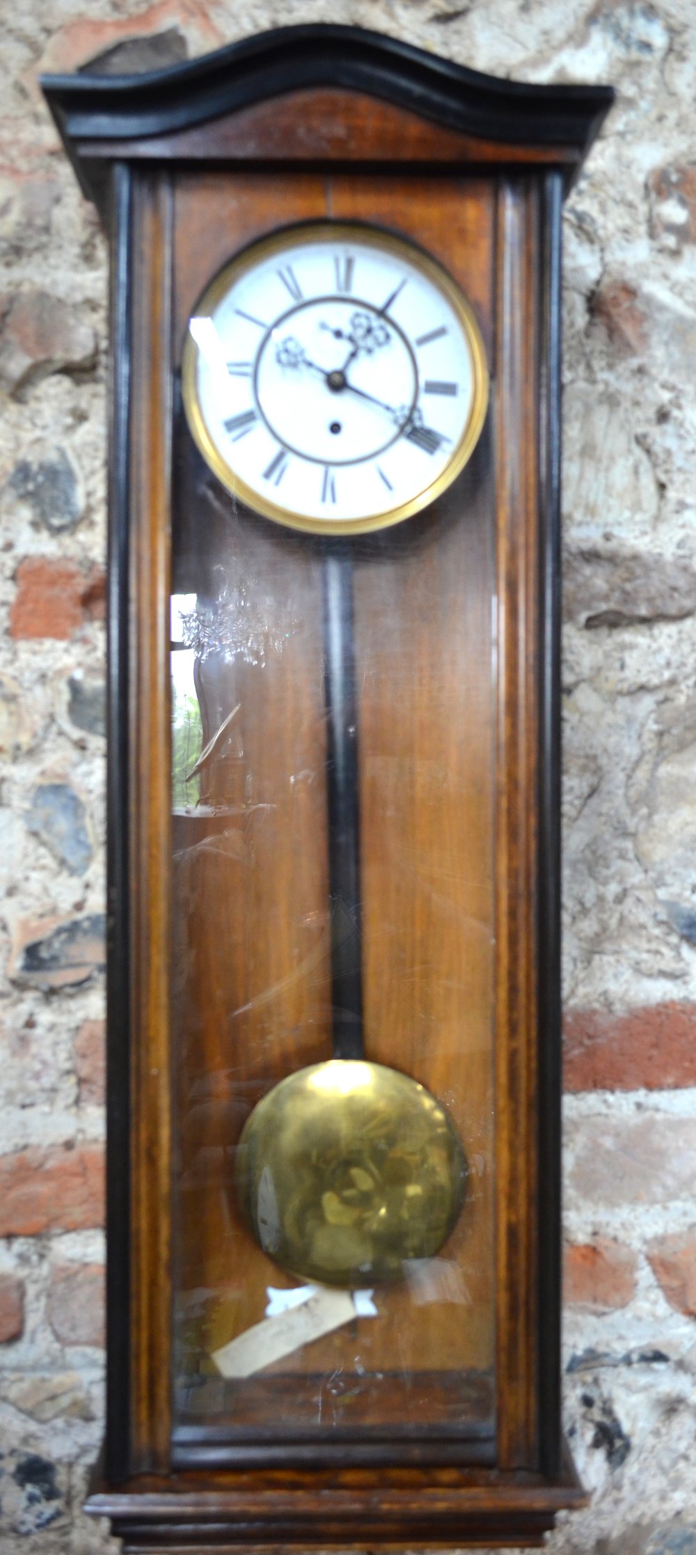 A late 19th century regulator style walnut cased wall clock with Gustav Beker movement,