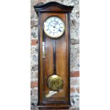 A late 19th century regulator style walnut cased wall clock with Gustav Beker movement,