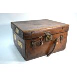 An Army & Navy leather uniform trunk,