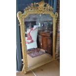 A good and large 19th century Louis XV style giltwood and composite over-mantel mirror,