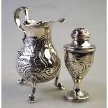 A George III silver pear-shaped cream jug with scroll handle and hoof feet, London 1749,