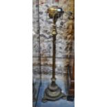 A Victorian lacquered brass rise and fall column oil lamp,