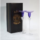 Two Rosenthal for Versace glass candlesticks having amethyst bowls, frosted mask knops,