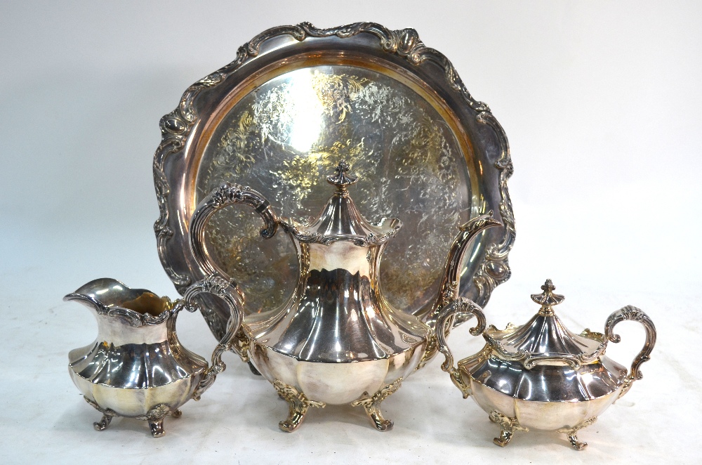 A large electroplated wine tray with pierced gallery, to/w a three-piece tea service,