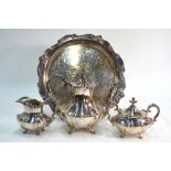 A large electroplated wine tray with pierced gallery, to/w a three-piece tea service,