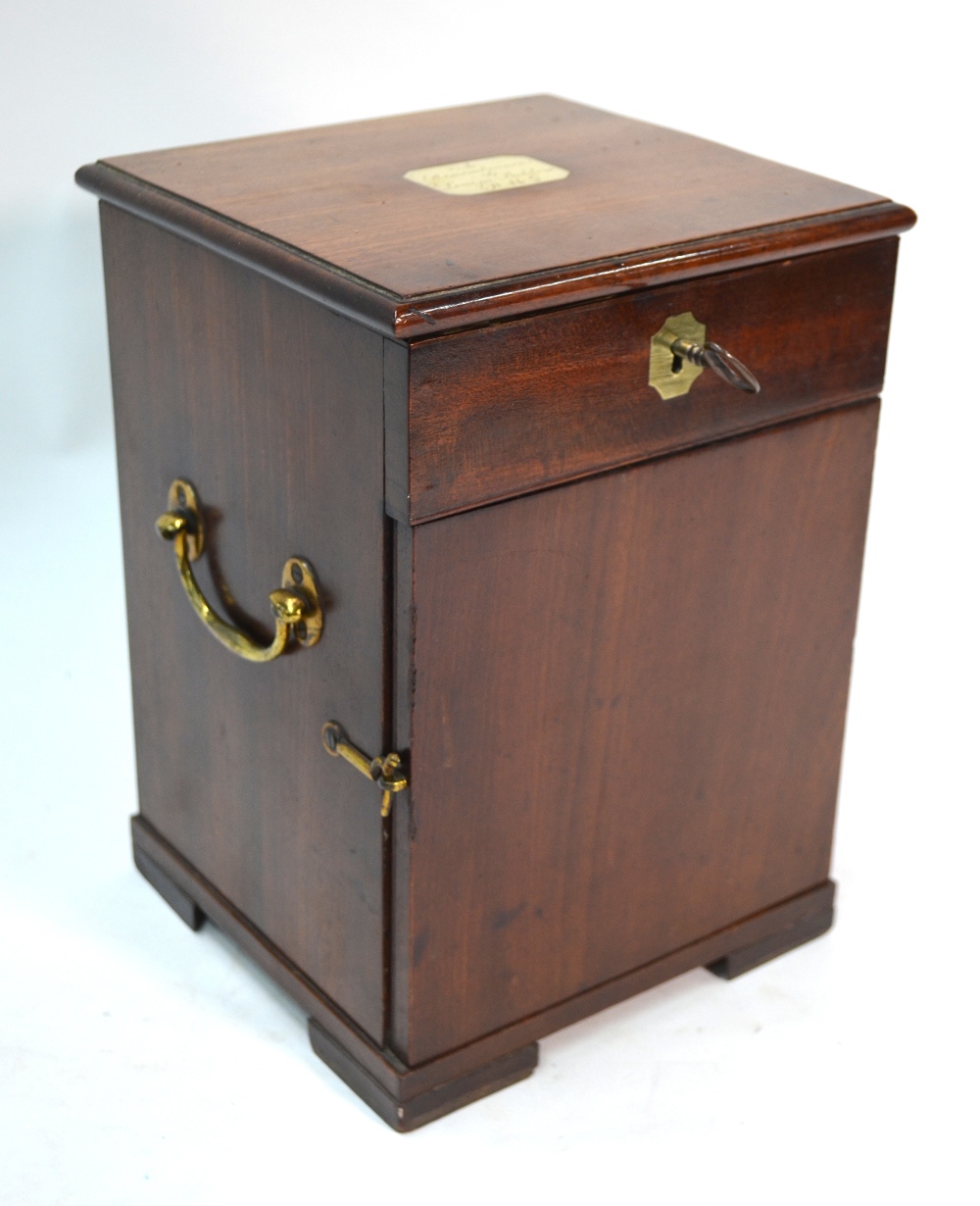 A George III mahogany travelling apothecary box, with brass carrying handles,