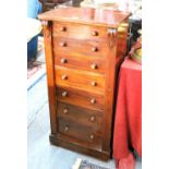 A late 19th century mahogany Wellington chest of seven graduated drawers, raised on a plinth base,