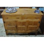 A Yorkshire golden oak sideboard by Kingpost circa 1950's,