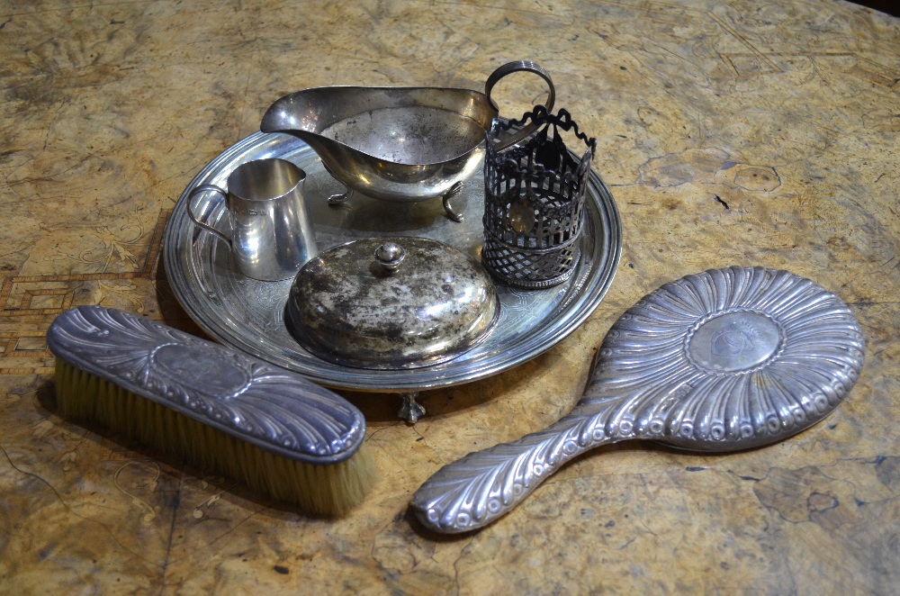 An Edwardian small silver cream jug of plain tapering form, Hukin & Heath, Birmingham 1901,