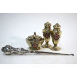 An EPNS 3 piece condiment set with enamel HMS Aquitania badges,