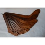 A vintage set of fifteen wooden sock size forms,