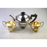 An octagonal silver three-piece tea service, Thomas Edward Atkins, Birmingham 1910,